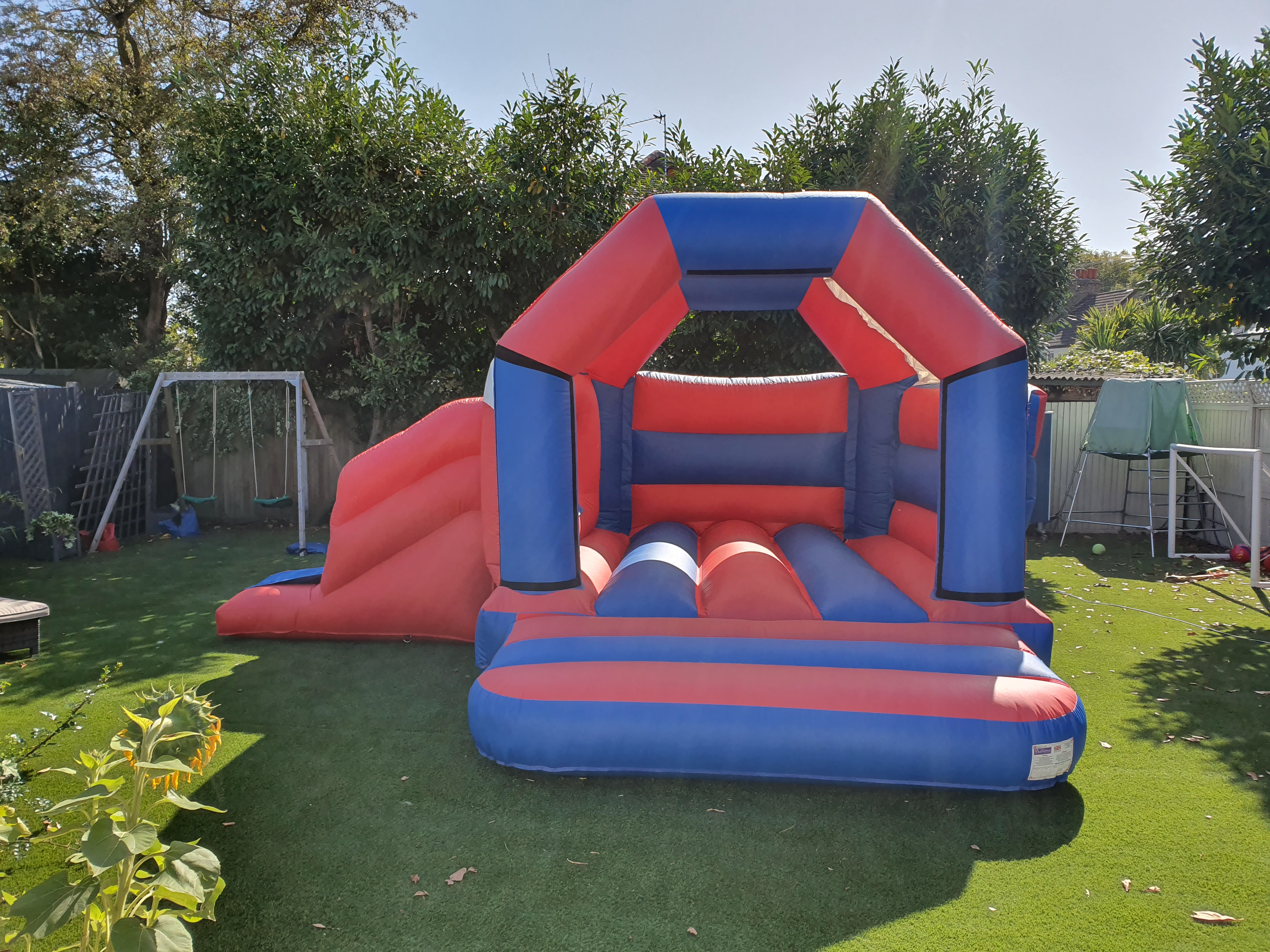 bouncy castle with slide to hire